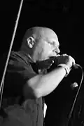 A man facing right