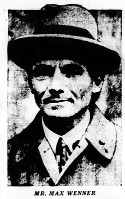 Grainy black-and-white undated headshot of Max Wenner, a clean-shaven man wearing a suit and tie, overcoat, and hat