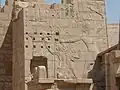 Wall relief of Ramses III on migdol of Medinet Habu, Theban Necropolis, Egypt