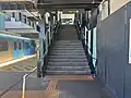 The stairs leading up to the concourse from Platform 2, December 2024