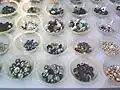 Metal button production