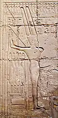 Belemnite shown on left of Min-Amun