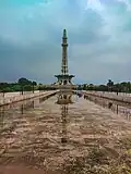 A view under cloudy sky with shadow on the marble floor