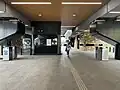 The station's main concourse, looking towards the exit, October 2024