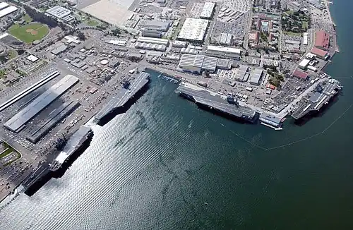 Four carriers (USS Constellation, USS Carl Vinson, USS Nimitz, USS John C. Stennis) at North Island, 2002