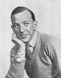 young, clean-shaven white man in neat, informal 1920s clothes