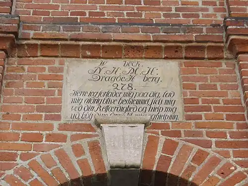 Detail of the sandstone tablet above the main entrance