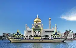 The mosque and the mahligai barge in the foreground