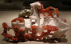 Ornament with persimmon, lily and ruyi fungus, chalcedony, 1900–49, Qing dynasty or Republic period. On display at the Asian Art Museum of San Francisco.