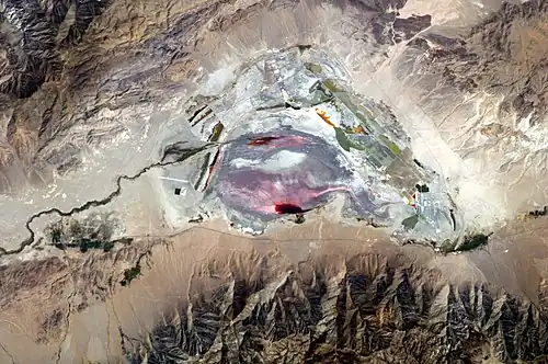 Astronaut photograph of the mostly dry bed of Owens Lake, California, US