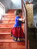 Girl dressed in langa and ravike, or pavadai sattai