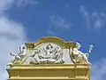 Pediment above entrance to castle.