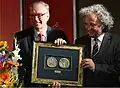 The Per Artem Ad Deum Medal awardig ceremony - Krzysztof Zanussi accompanied by Targi Kielce President Andrzej Mochoń PhD (2010)