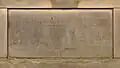The South facing plaque reads "Time wasted is existence; used is life. The slow sweet hours that bring us all things good, the slow sad hours that bring us all things ill, And all good things from evil. Not at once. Not all to be forgotten."