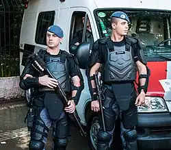 Military equipped with shotgun