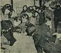 A picture of city folks voting.