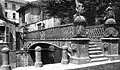 The bridge, originally in Via Visconti di Modrone, along the Navigli, was moved to the Parco Sempione after they were filled in.