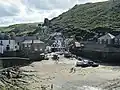 The rear of the pub (left) and its view of the harbour