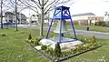 The bell, displayed on Wyndham Way.