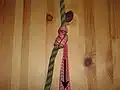 Locked while holding tension.