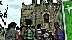 In front of the church in Pustunich, 2015