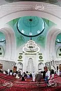 The mihrab, with one of the six main domes above