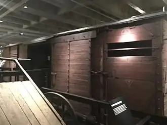 (Exterior) A2 railcar owned by Deutsche Reichsbahn and donated by the Chief Commission for the Prosecution of Crimes against the Polish Nation in 1991[35][36]
