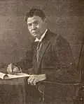 Singh in his writing desk