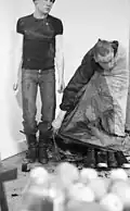 Reindeer Werk in performance (1975) Thom Puckey and Dirk Larsen. Galerie St. Petri, Lund, Sweden. Photographer - Angela Spanswick