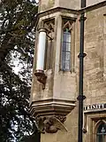 Wall-mounted Richardson candle on Trinity Street
