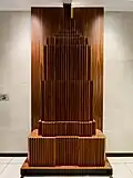 A statue of the tower itself within the resident lobby entrance in the Deco Tower.