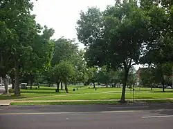 Looking south on St. Louis Ave into St. Louis Place Park
