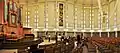 Interior of the NBBJ-designed Plymouth Congregational Church (built 1967–1968) in the Metropolitan Tract. Principal architect Donald Arthur Winkelmann.[209]