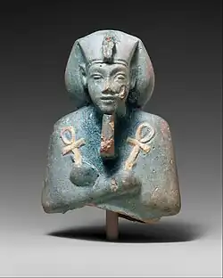 Shabti of Akhenaten; 1353–1336&nbsp;BC; faience; height: 11&nbsp;cm, width: 7.6&nbsp;cm, depth: 5.2&nbsp;cm; Metropolitan Museum of Art (New York City)
