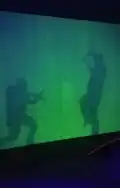 After removing the light source, shadows are visible on the wall.