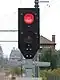 Simplified stop signal displaying 'halt' (red)