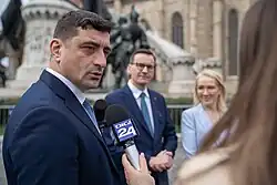 Image 42AUR leader George Simion answering a question from a Digi 24 reporter in Cluj-Napoca, 2025 (from Freedom of the press)