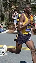 Sisay Lemma, elite men's winner, near the halfway point of the race