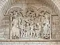 Relief of Saint Benedict and Saint Peter surrounding monk Theophilus' miracle, on the 12th-century romanesque portal inside of St Mary's abbey church