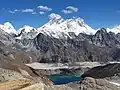 Arakam Tse is the dark peak to right, Mount Everest centered