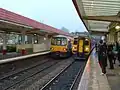 A Class 144 'pacer' (left) and a Class 158 'sprinter' (right) at the station in 2011.