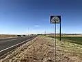 SR-100 midroute reassurance without directional banner, just beyond the 90° turn near Flowell. This one is facing northbound (westbound) traffic (May 2020)
