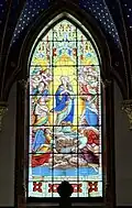 Stained glass window in the apse