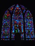 The stained glass window behind the altar inside St. Peter's Catholic Church in Brownsville, Pennsylvania