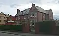 St Augustine's Priory, Old Colwyn, with Sacred Heart Church on the left