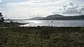 Strachur Bay Not the outflow of the Cur - that runs most of the length of Cowal, via Loch Eck to the Holy Loch, but a smaller burn. Dùn Leacainn visible across Loch Fyne.