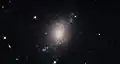 ESO 486-21 is a spiral galaxy with a somewhat irregular and ill-defined structure.[16]