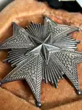 Grand Cross breast star