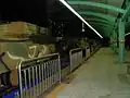 Tanks passing through the station