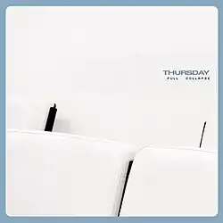 Four leather chairs against a white wall, surrounded by a blue border
